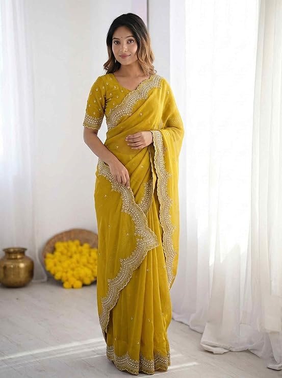 Celebrate timeless Indian tradition with this beautiful mustard yellow Bandhani print saree